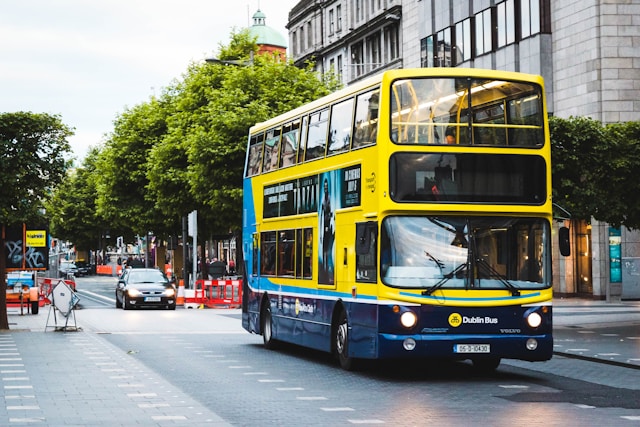 qwfqw0evyum-1-1 double-decker bus near building